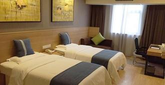 Greentree Inn Yancheng Investment City Business Hotel - Yancheng - Bedroom