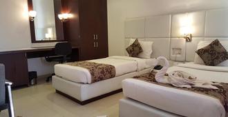 The Manor Hotel - Aurangabad - Yatak Odası