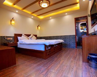 Putuo Memory Boutique Inn - Zhoushan - Habitación