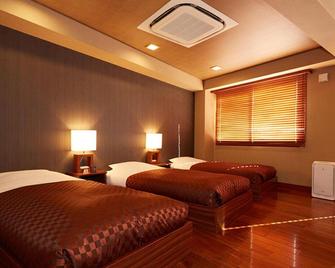 Hotel Saika - Fujisawa - Slaapkamer