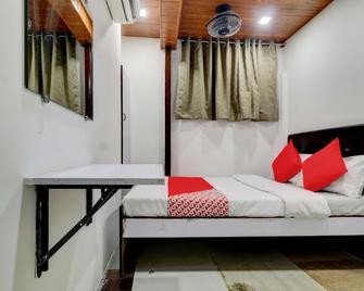 Hotel O Memsaab Family Residency - Mumbai - Bedroom