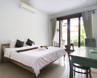 The Wina Echo Beach Guest House - North Kuta - Habitación