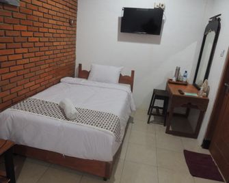 Dalem Sudarno Syariah by Ndalem Beong - Borobudur - Slaapkamer