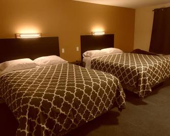 West View Motel - Hanna - Habitación