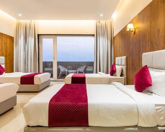 Gaurison Hotel & Resorts - Ujjain - Bedroom