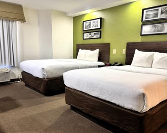 Travelodge by Wyndham Flowood/Jackson/Airport North - Jackson - Camera da letto