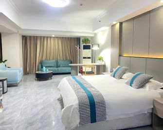 Wanda Lansheng Apartment Hotel - Bengbu - Camera da letto