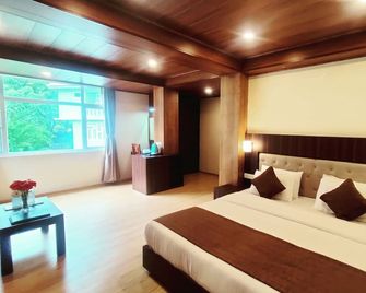 Keswani Group Tashi Heritage Hotel - גנגטוק - חדר שינה