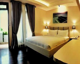 Millinov Boutique Hotel - Gorontalo - Bedroom