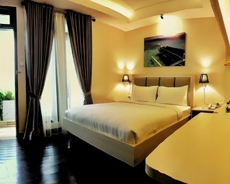 Millinov Boutique Hotel - Gorontalo - Bedroom