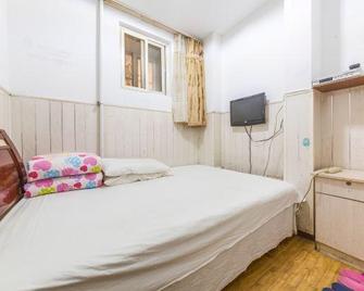 Shun Feng Yuan Hostel - צ'ינגדאו - חדר שינה