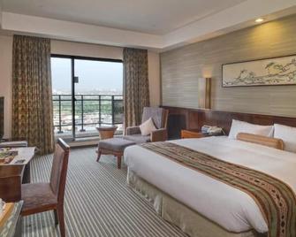 Nice Prince Hotel - Chiayi City - Bedroom