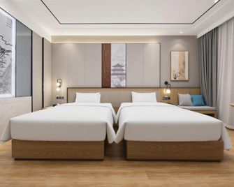 Shui An Hua Cheng Hotel - Langfang - Schlafzimmer
