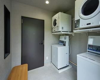 Twin room with bathroom 1F / Oshimagun Kagoshima - Amami - Wäscheservice