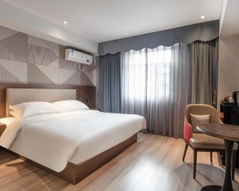 Borrman Hotel Mianyang Fucheng District High-Speed Railway Station - Mianyang - Camera da letto