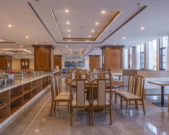 Yulong Xuena Hotel (Lijiang High-speed Railway Station) - Lijiang - Restaurant