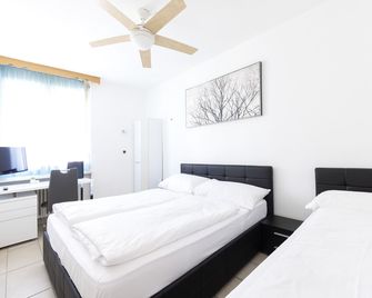 Hotel San Carlo - לוג'אנו - חדר שינה