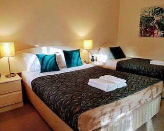 Rockhampton Palms Motor Inn - Rockhampton - Bedroom