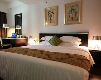 Ritz Garden Hotel - איפו - חדר שינה