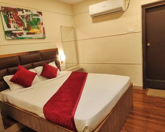 Hotel Ananta by Nivora Hospitality - Nagpur - Schlafzimmer