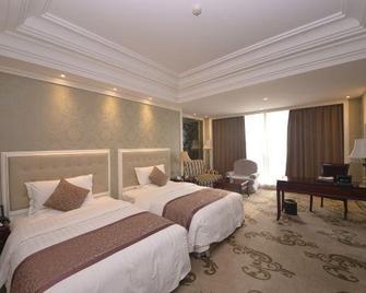Fengguan Holiday Hotel - Dezhou - Bedroom