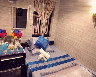 Day And Night Hostel - Hong Kong - Slaapkamer