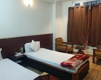 Hotel Shillong Rains Inn By Roh - Shillong - Bedroom