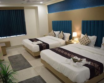 Hotel Royal Square - Gandhinagar - Спальня