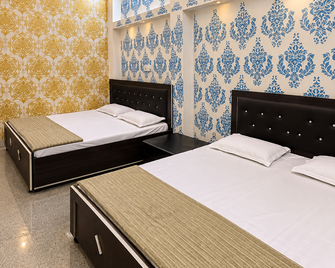Baba Residency - Ayodhya - Bedroom