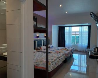 Strawberry Garden Hotel - Ranau - Schlafzimmer