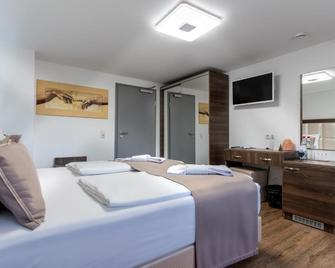 Hotel Myrsini - Tübingen - Slaapkamer