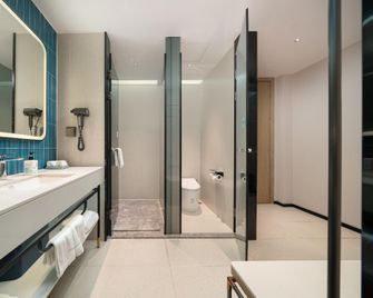 Echarm Hotel Bozhou Outlet Haowangfu - Bozhou - Спальня