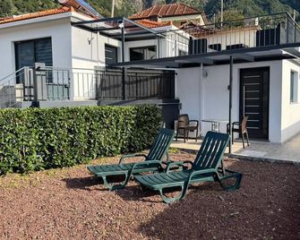 GuestReady - Tranquil Retreat in Nature's Embrace - São Vicente - Pátio