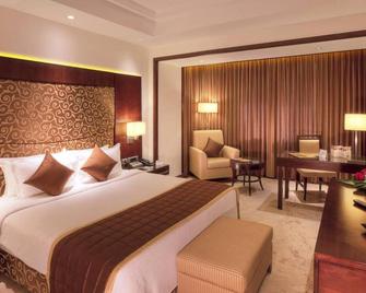 Anandha Inn Convention Centre and Suites - 蓬蒂切里 - 臥室