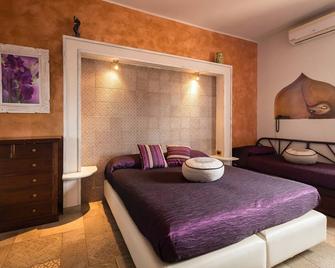 Hotel Ristorante Cavalluccio Marino - Лампендуса - Спальня