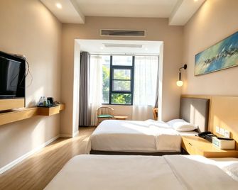 Anyu Garden Hotel (Guanying Ancient Street Branch) - Yibin - Bedroom