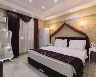 Melrose House Hotel - Pamukkale - Kamar Tidur