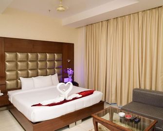 Hotel Swan - Panchkula - Slaapkamer