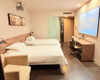 Jinjiang Select Yancheng Dafeng Jinfeng South Street Branch - Yancheng - Camera da letto