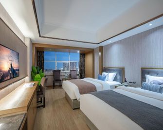 Sunshine Paris Business Hotel - Quanzhou - Quarto
