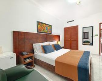 Tama Hotel Granada Real Cali - Cali - Bedroom