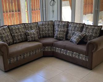 Fenced villa with in-ground pool. - West Bay - Lounge