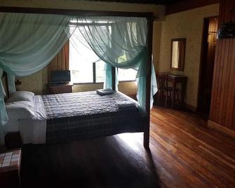 Hotel el Portico - Heredia - Спальня