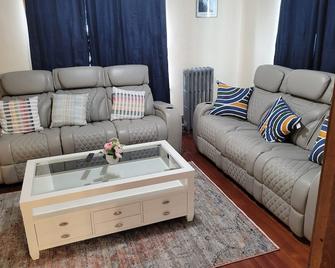 COZY HOME- Located on a quiet Worthy Street with a home in its own compound. - Springfield - Living room
