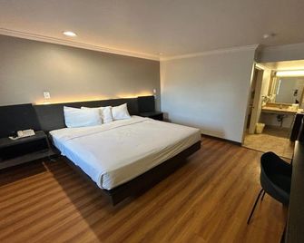 1 King Bed | Non-Smoking, Micfridge - Mojave - Gebäude