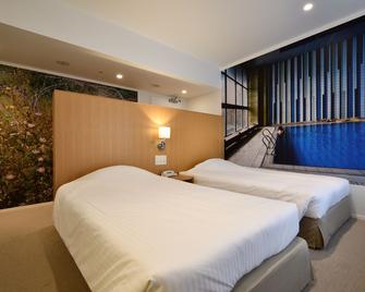 هوتل أرت ستاي ناها كوكوساي ستريت - ناها - غرفة نوم