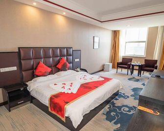 Baling Stone Theme Hotel - Chifeng - Bedroom