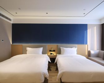 Elong Anyue Hotel Nanjing Banqiao Wuyue Plaza - Ναντσίνγκ - Κρεβατοκάμαρα
