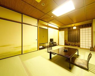 Kochi Sunrise Hotel - Kochi - Yatak Odası