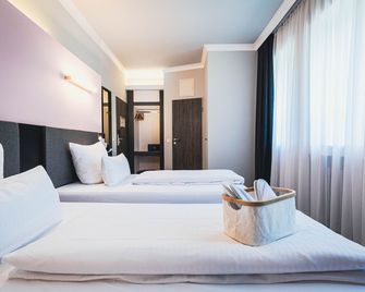 MountainPark | Event- und Tagungshotel - Кассель - Спальня